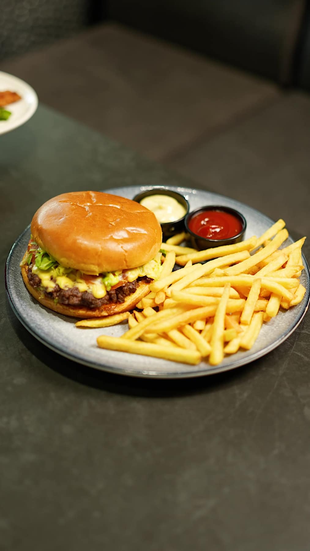Burger and fries served at SPACE Restocafe